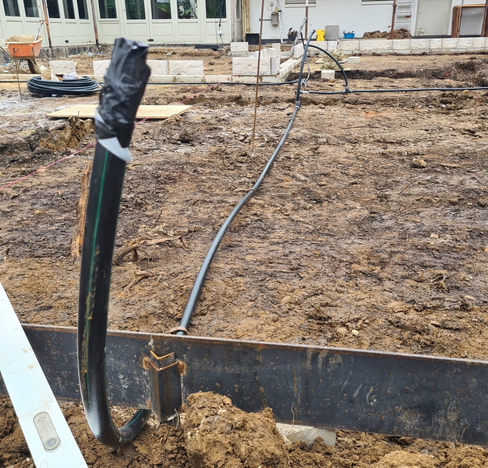 Laying pipes before topsoil